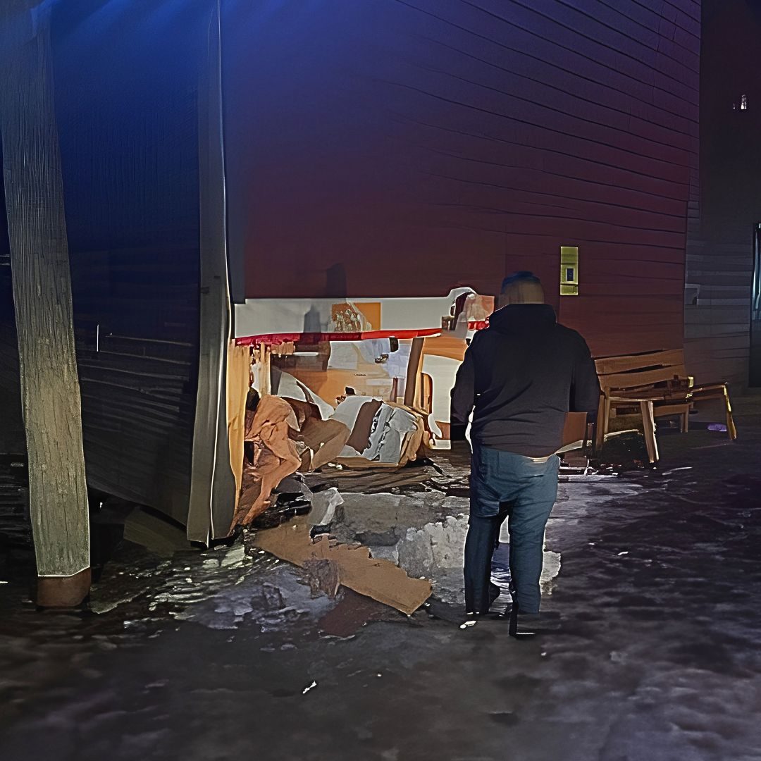 RMFC Peacekeeper inspects structural damage at the Community Hall after a vehicle collision, November 2025