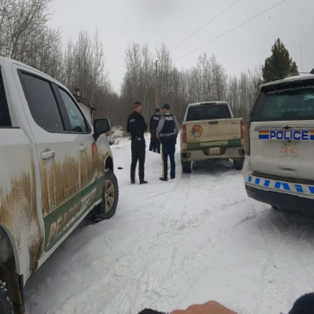 RMFC Peacekeepers and police deliver a Band Council Resolution notice at Alexis Nakota Sioux Nation, April 2026